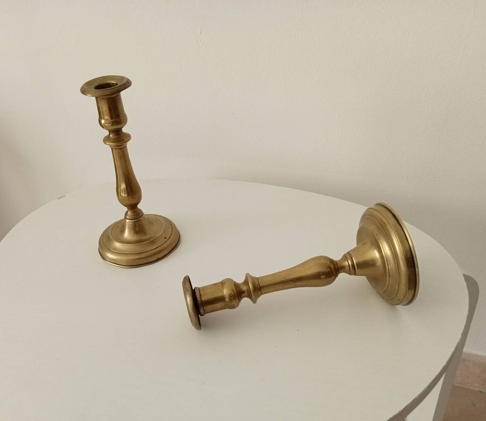 Pair of old candlesticks in solid gilded brass