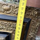 Large antique gilt mirror with scroll and shell decoration, 144 cm