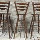 3 vintage wooden bar stools from the 60s/70s with a bistro spirit.