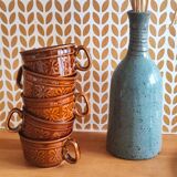 Caramel brown ceramic mugs with geometric flower pattern from the 70s