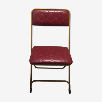 Golden and burgundy chair