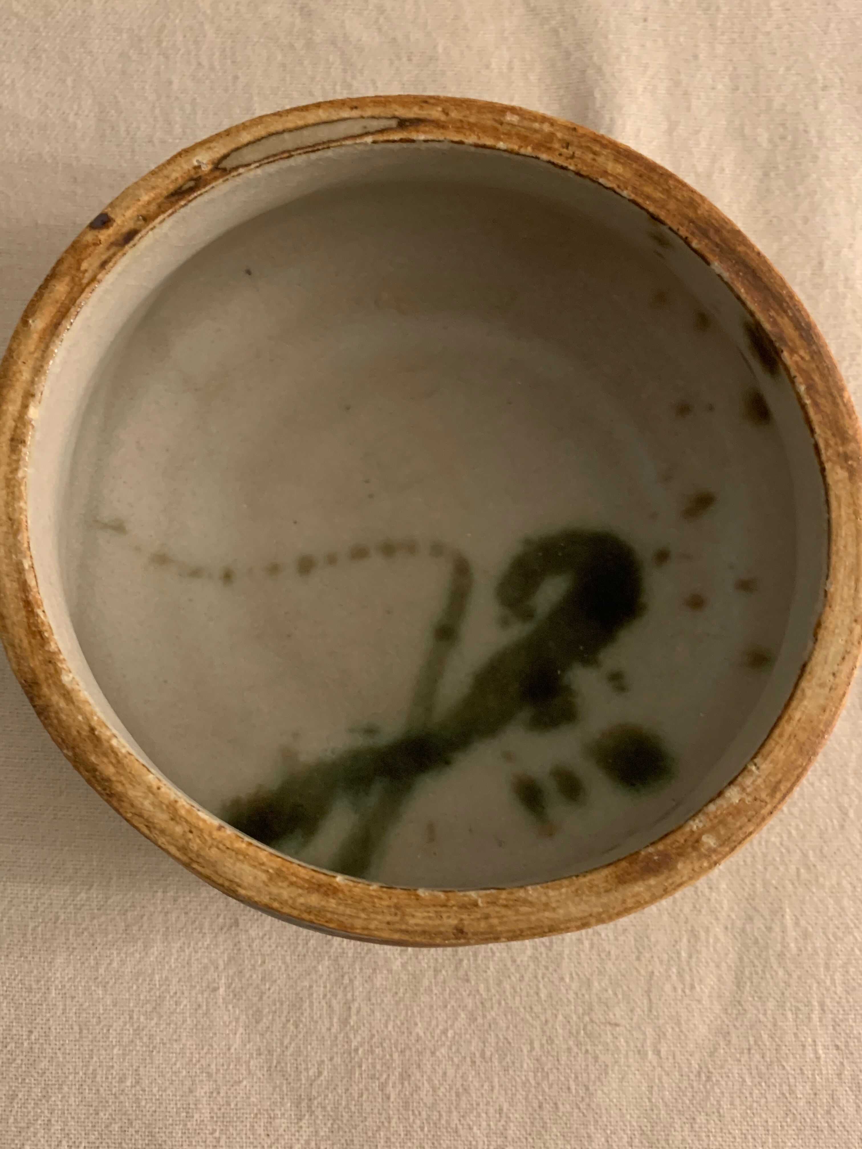 Ancient pot and its lid Pottery of the Dove in sandstone 1975