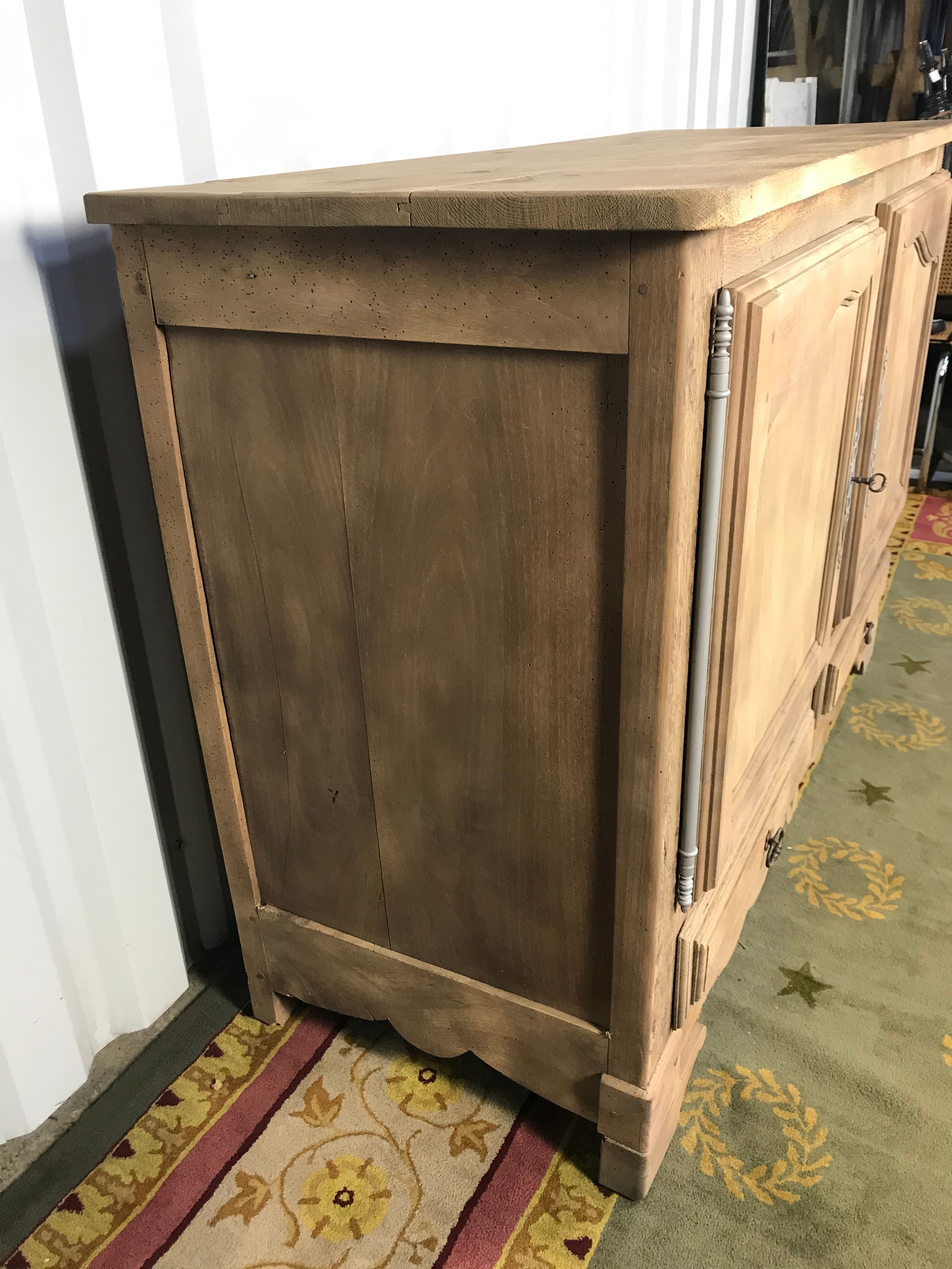 Rustic bass buffet in solid oak erased