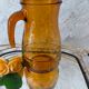 Cruche vintage à eau verre ambré  fabriquée en italie  des années 60/70