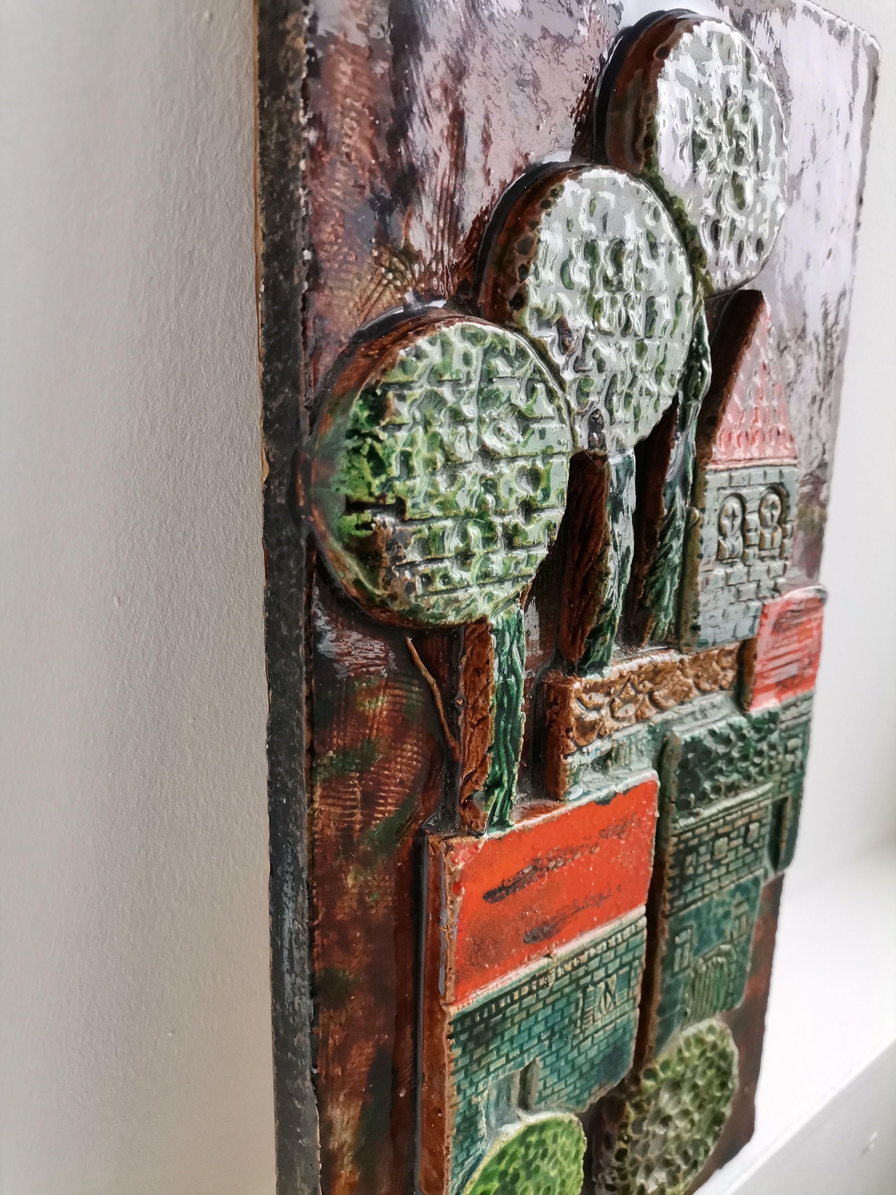 Decorative enamelled wall plate signed