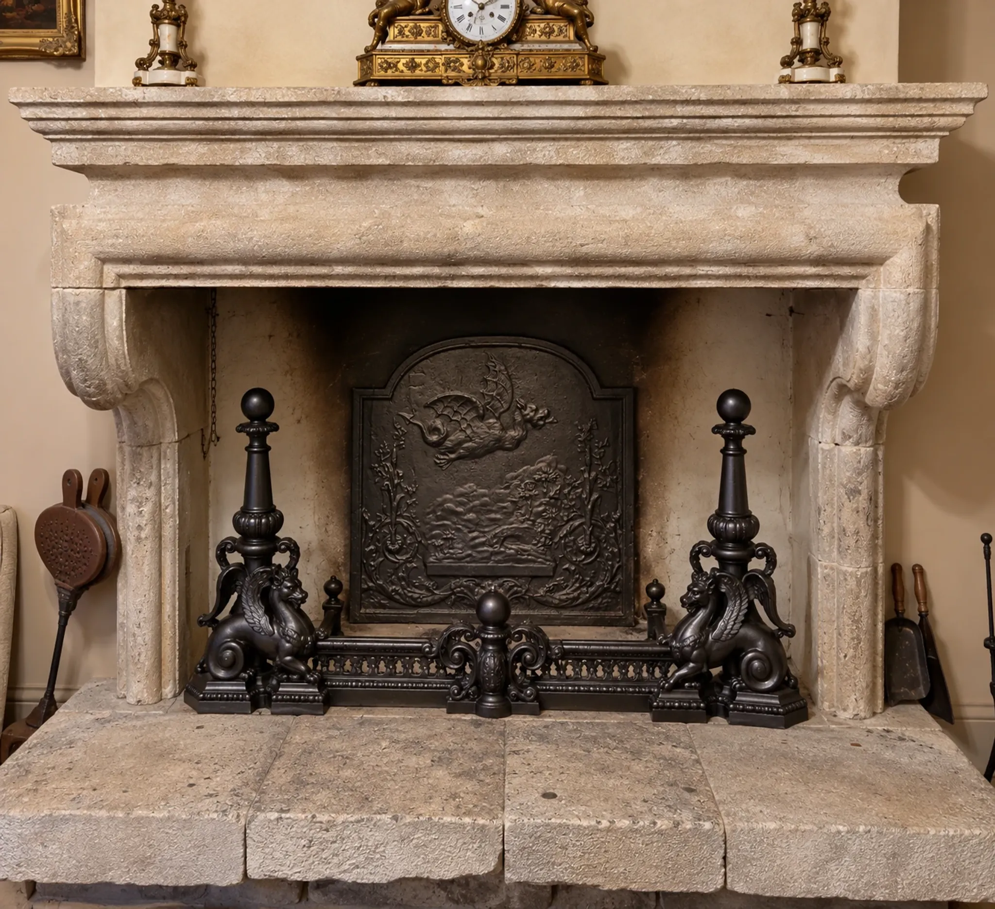 19th-century cast iron fireplace set, bar, andirons & plaque with griffins