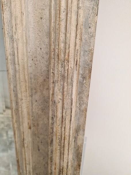 Beveled mercury patinated trumeau mirror