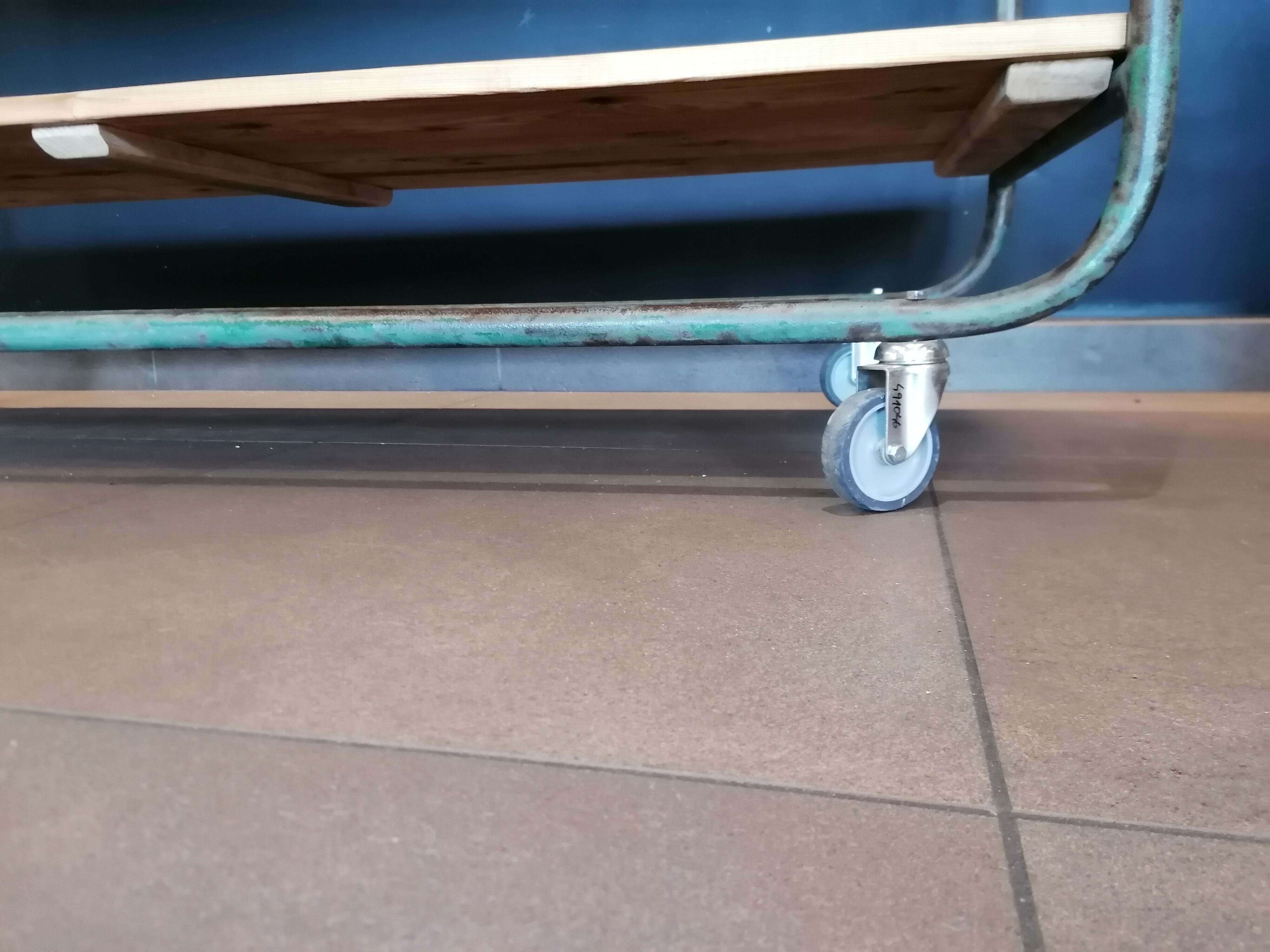 Steel and wooden shelf on wheels
