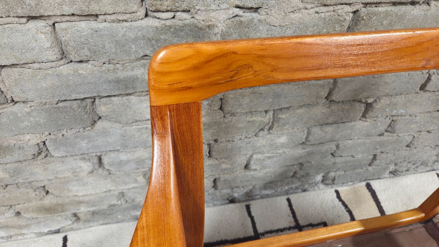 Danish canapé and its 1970s teak armchair