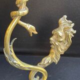 Old table lamp in bronze and brass gilded with satyr and snake