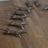 Brass crocodile knife holder