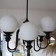 Metal chandelier and glass globes