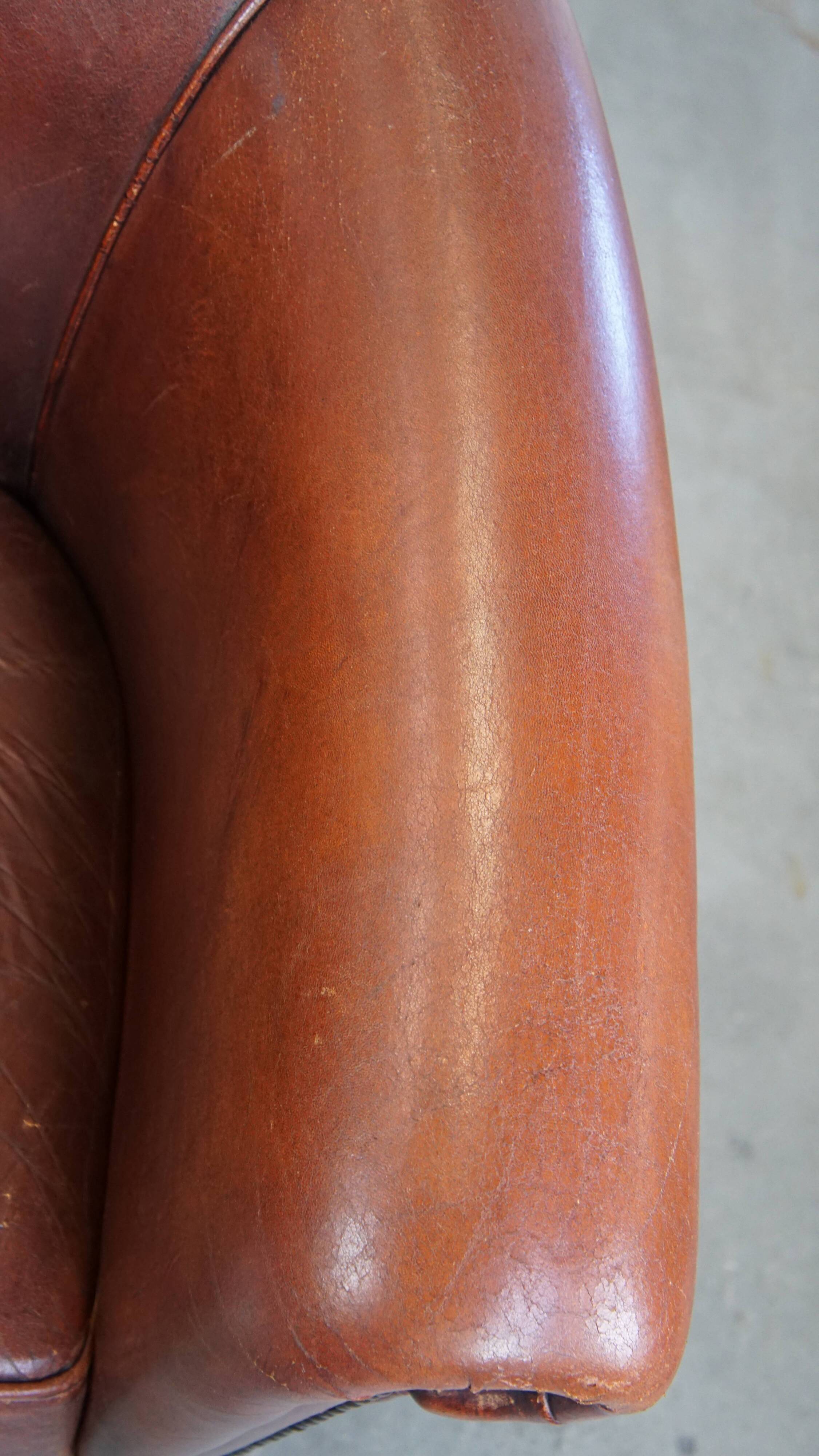 English style sheepskin club chair with a beautiful patina
