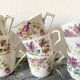 Antique flowered porcelain cups mismatched