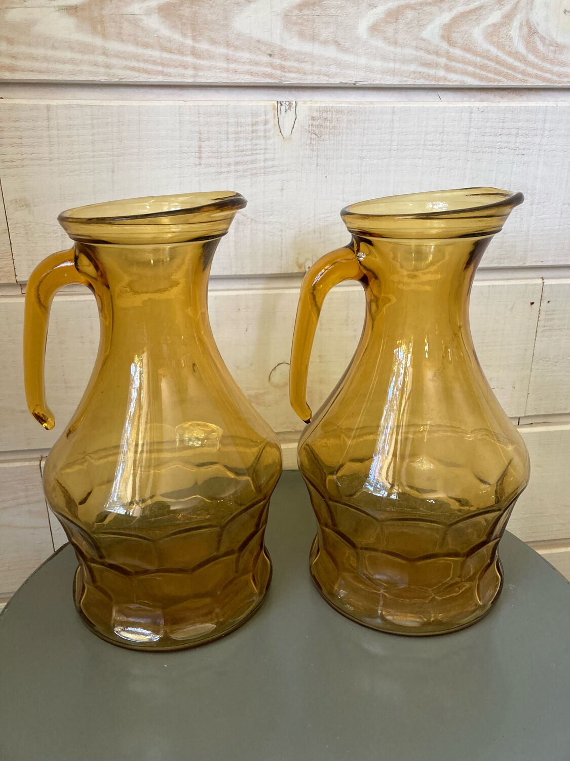 Pair of smoked glass pitchers