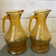 Pair of smoked glass pitchers