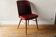 Chaise en skai rouge, pieds compas, années 60
