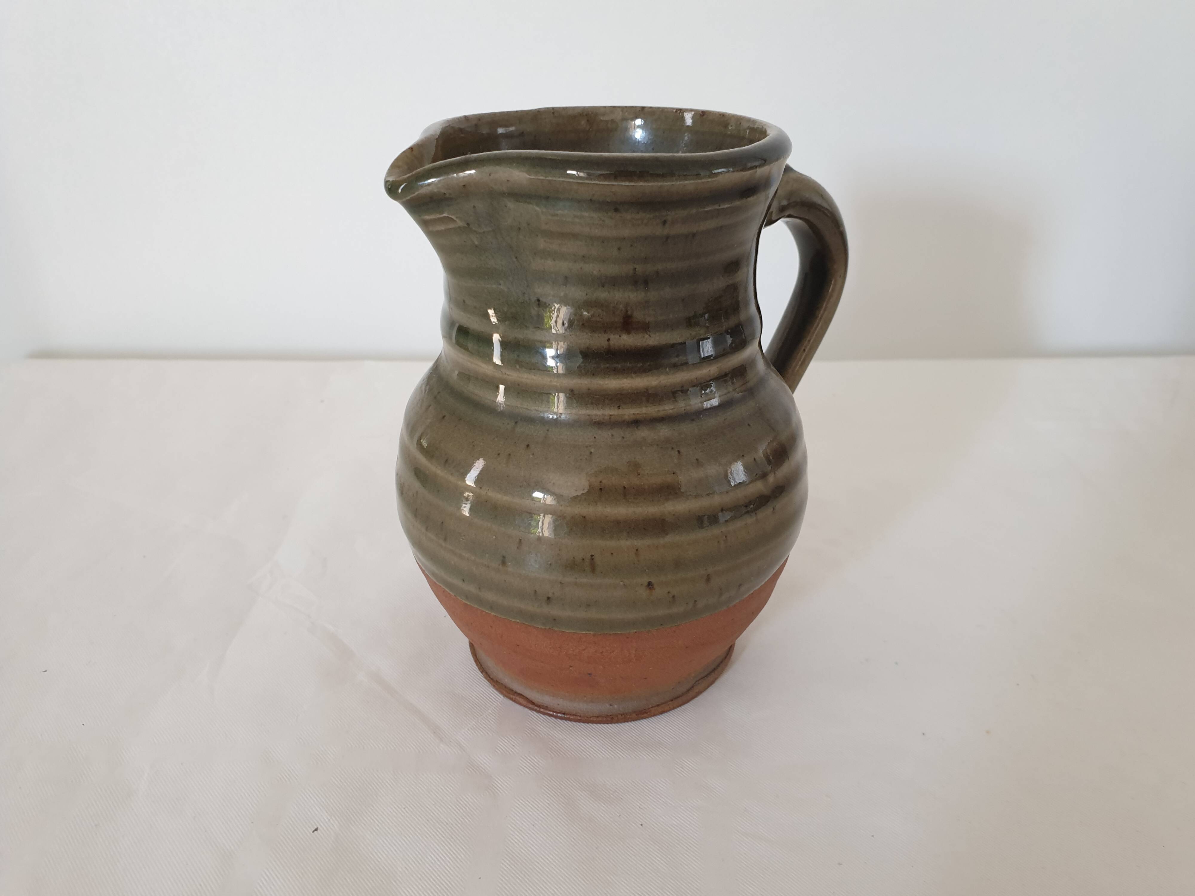 Small pitcher in glazed ceramic signed JC Seguin Puisaye (pictogram)