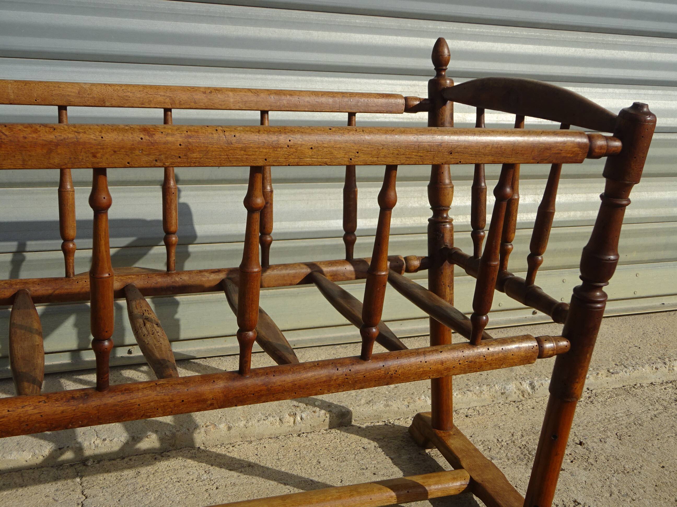 Old wooden cradle, all in walnut