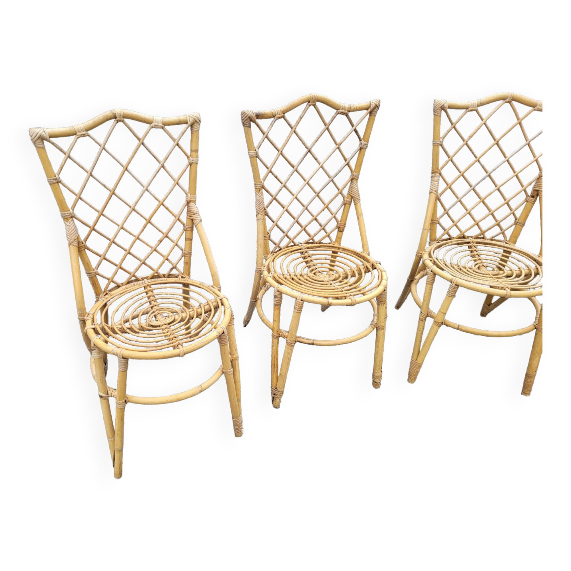 7 vintage rattan chairs