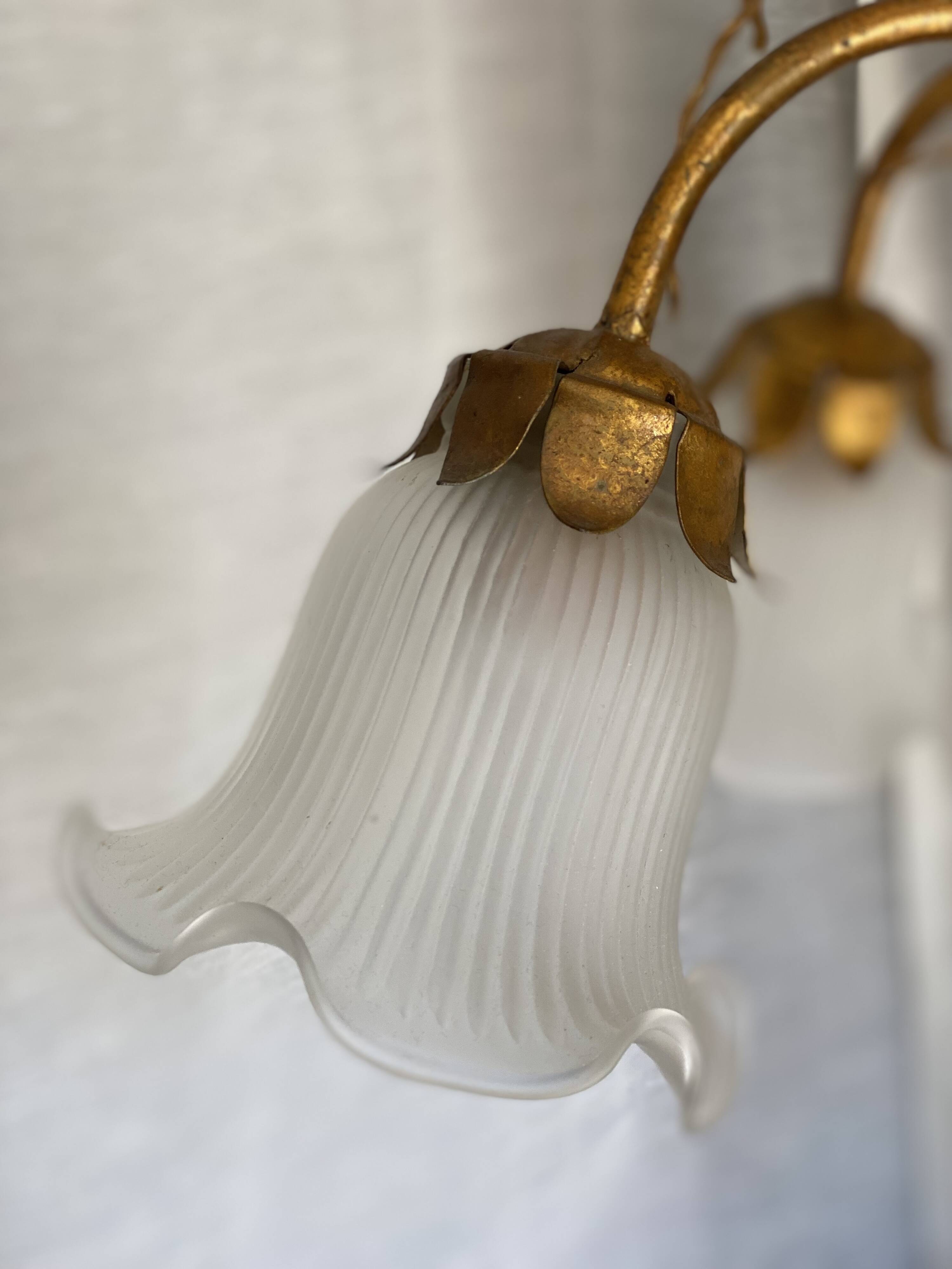 Vintage 1970s golden metal palm chandelier in the style of JANSEN.