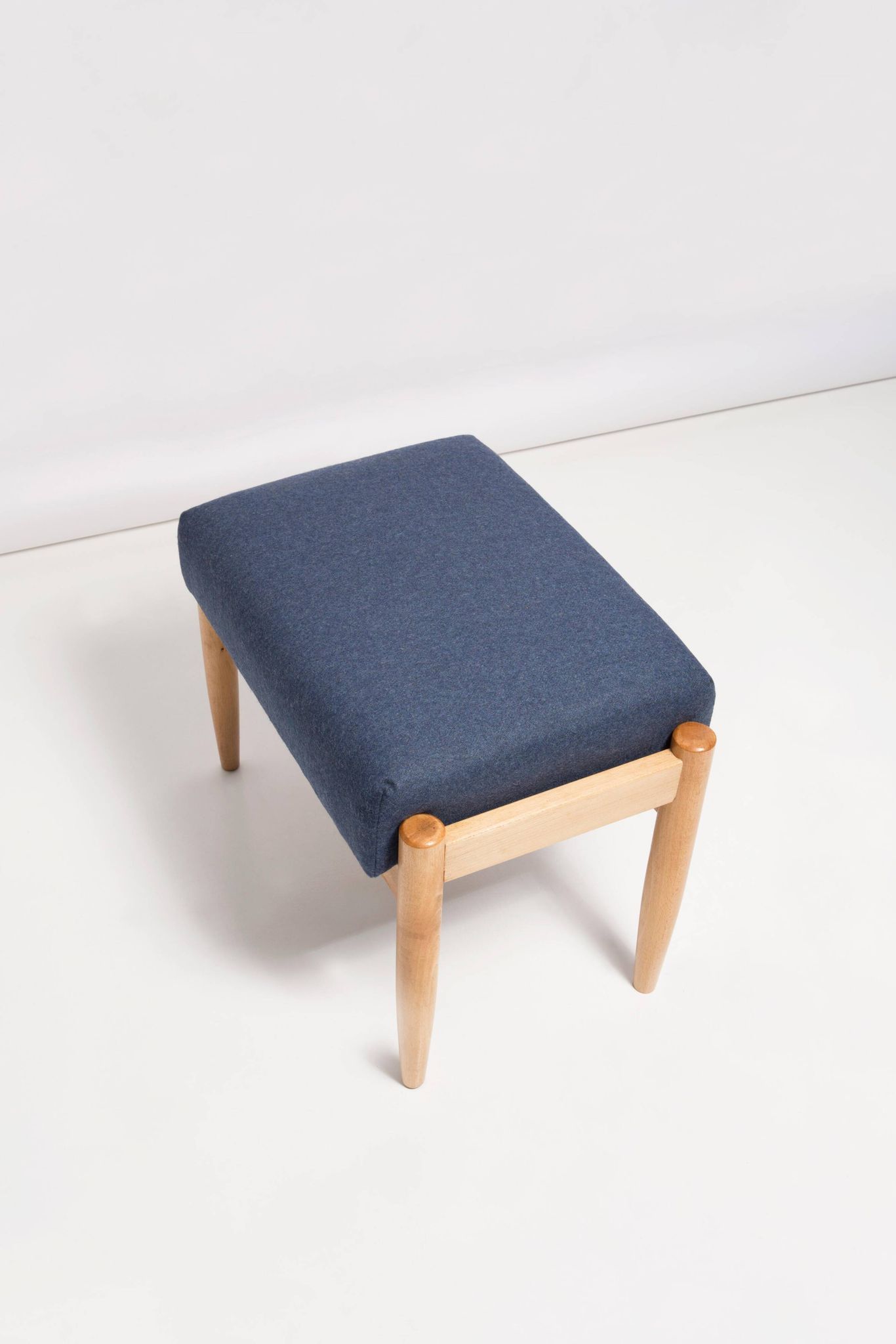 Pair of vintage navy blue wool stools from the mid-20th century, Edmund Homa, 1960s.