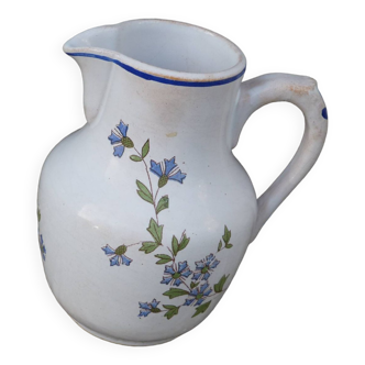 Old blue and white ceramic pitcher