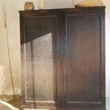 Old black wardrobe - wooden drawers and labels of origin