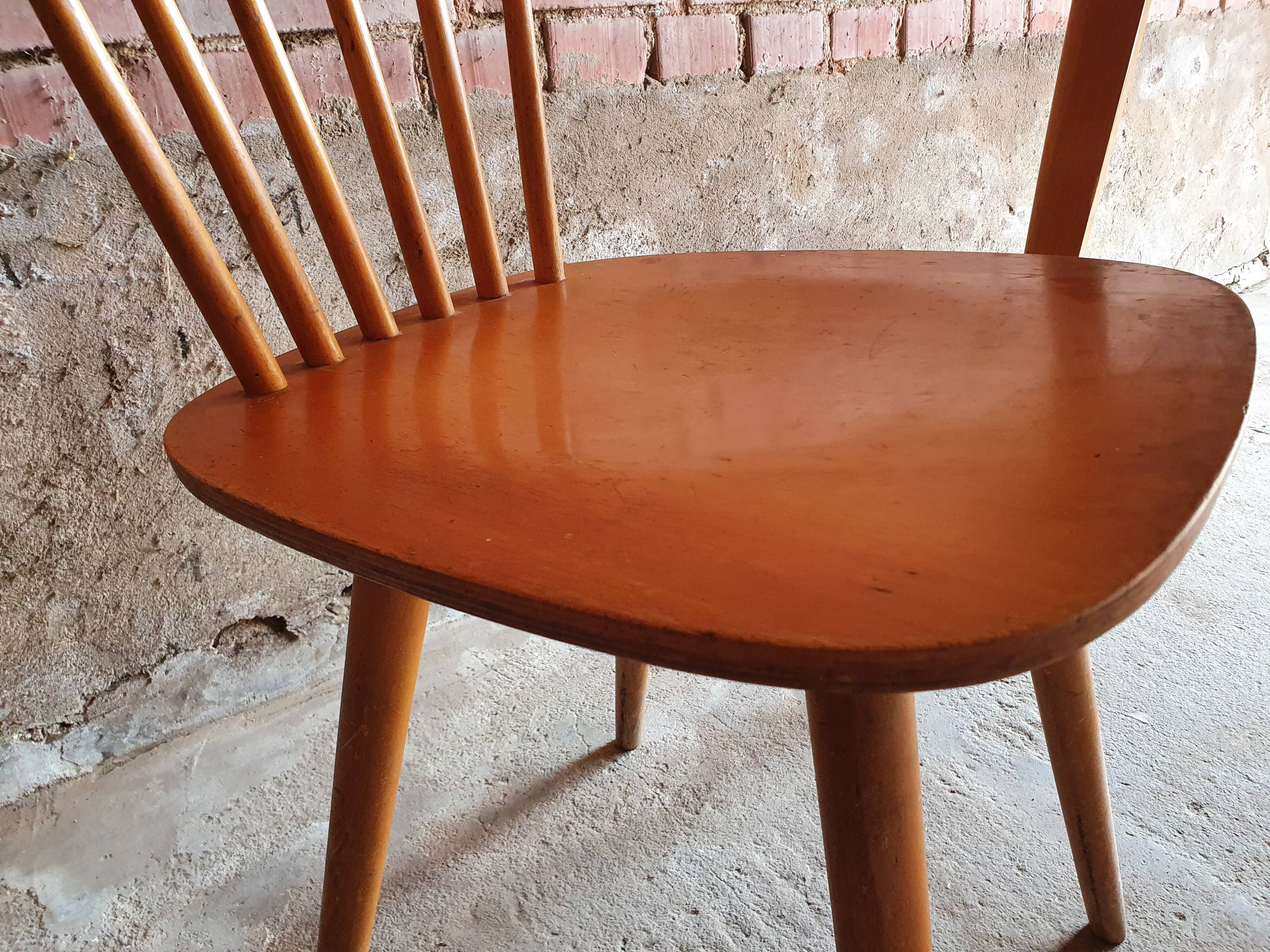 Together two Scandinavian chairs and its wooden and formica table