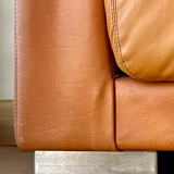 Pair of vintage armchairs Gérard Guermonprez tawny leather and stainless steel, France 1970