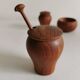 Small, beautiful lot consisting of a salt cellar, pepper shaker and honey jar.