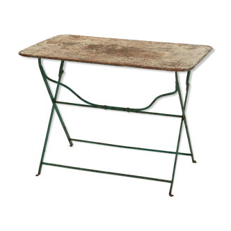 Old folding rectangular iron garden table