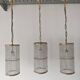 Set of 3 cylindrical crystal chandeliers in mid-century modern style attributed to Lobmeyr.