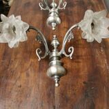 Pair of wall sconces with 2 light arms