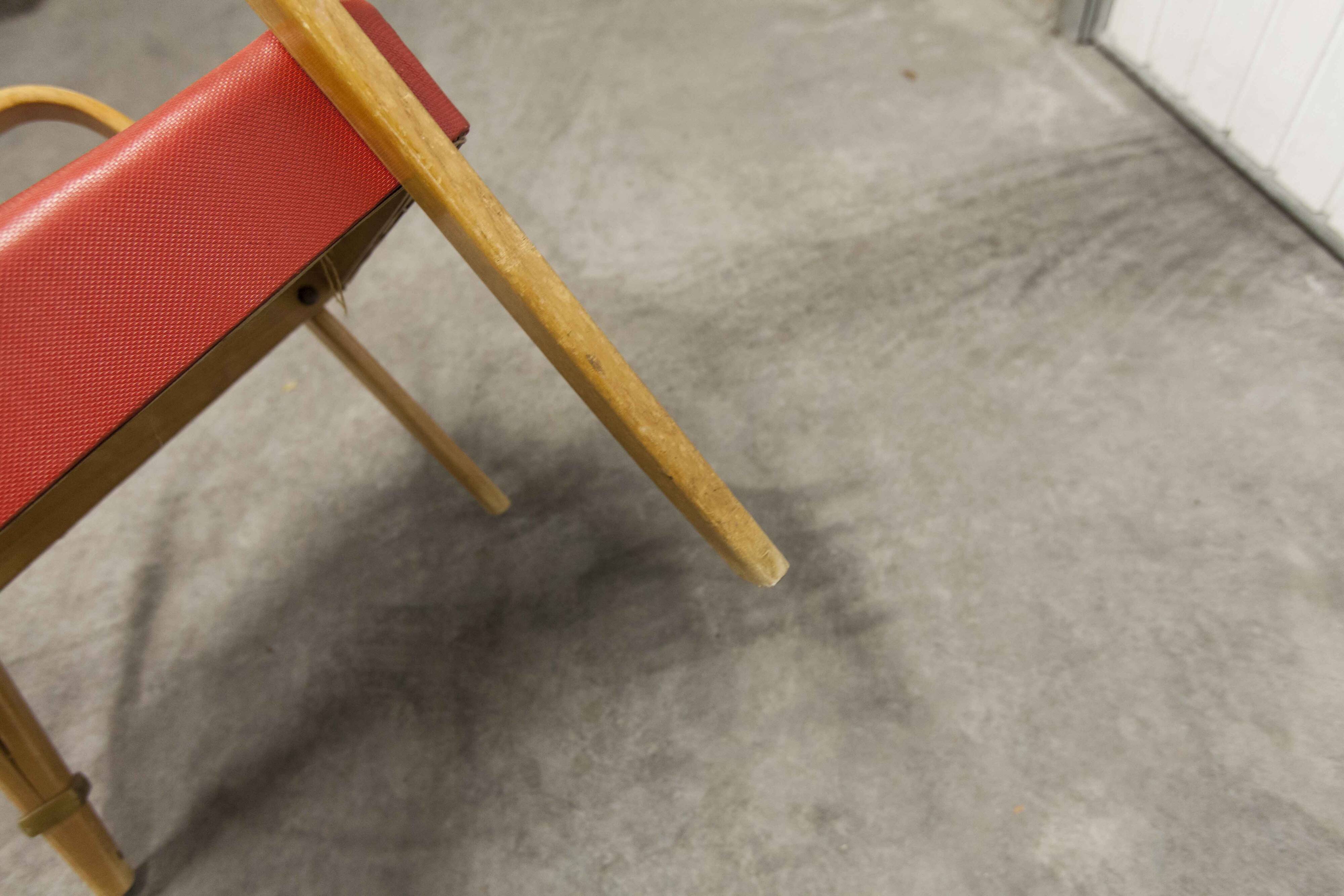 Bow wood armchair by Hugues Steiner 1960 red