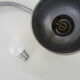 Old industrial articulated lamp with vice. Year 50