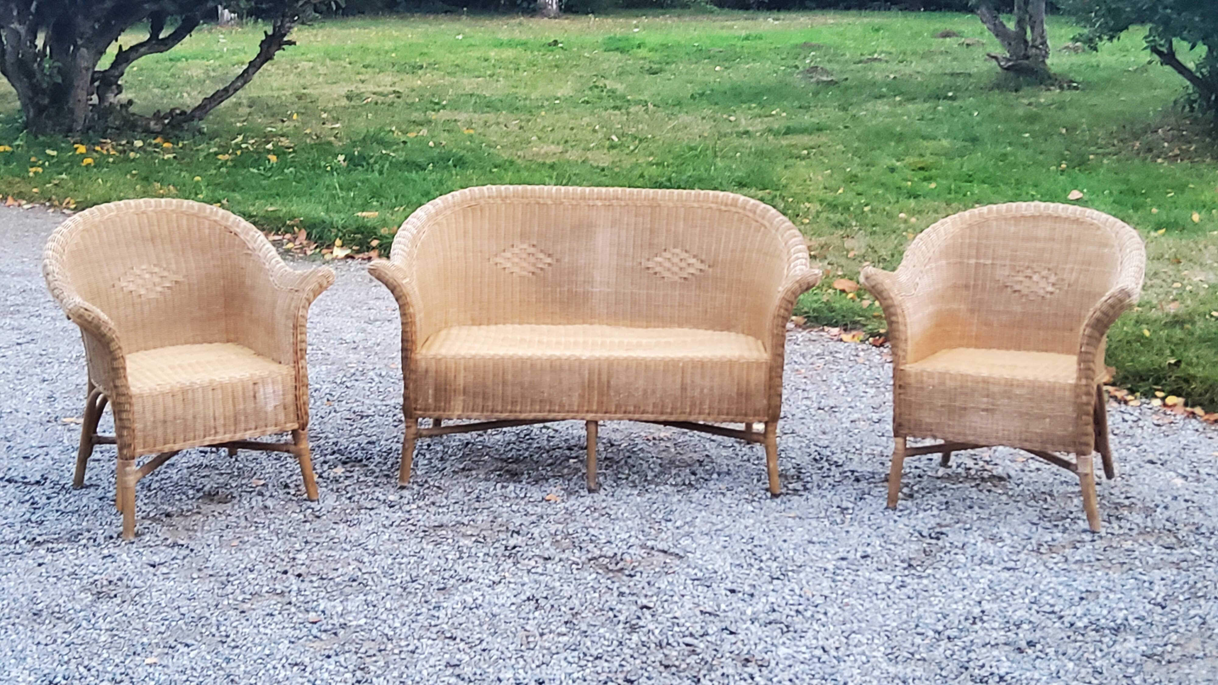 Pair of armchairs and bench in rattan and bamboo from the 60s/70s