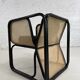 Cubic armchair in black rattan and canework