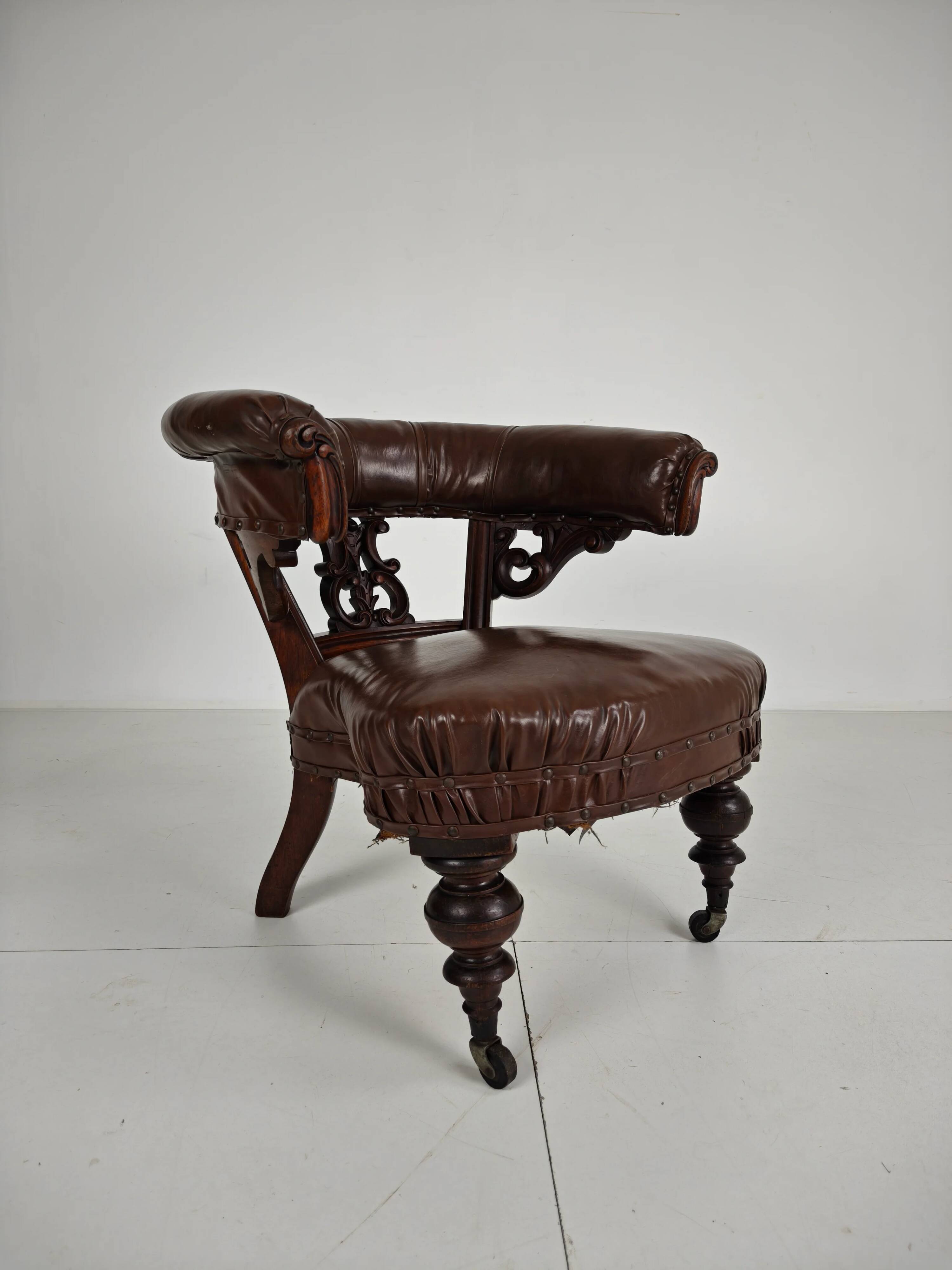 Antique leather armchair by Robson & Son – carved wood & castors, Newcastle