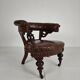 Antique leather armchair by Robson & Son – carved wood & castors, Newcastle
