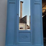 Parisian Art Deco armoire with beveled mirror and painted decoration