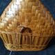 Vintage wicker and braided bamboo bottle