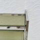 Chrome and smoked glass shelf in Italian 1970s style.