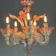 Small Venetian chandelier in colorless and red Murano glass, circa 1950