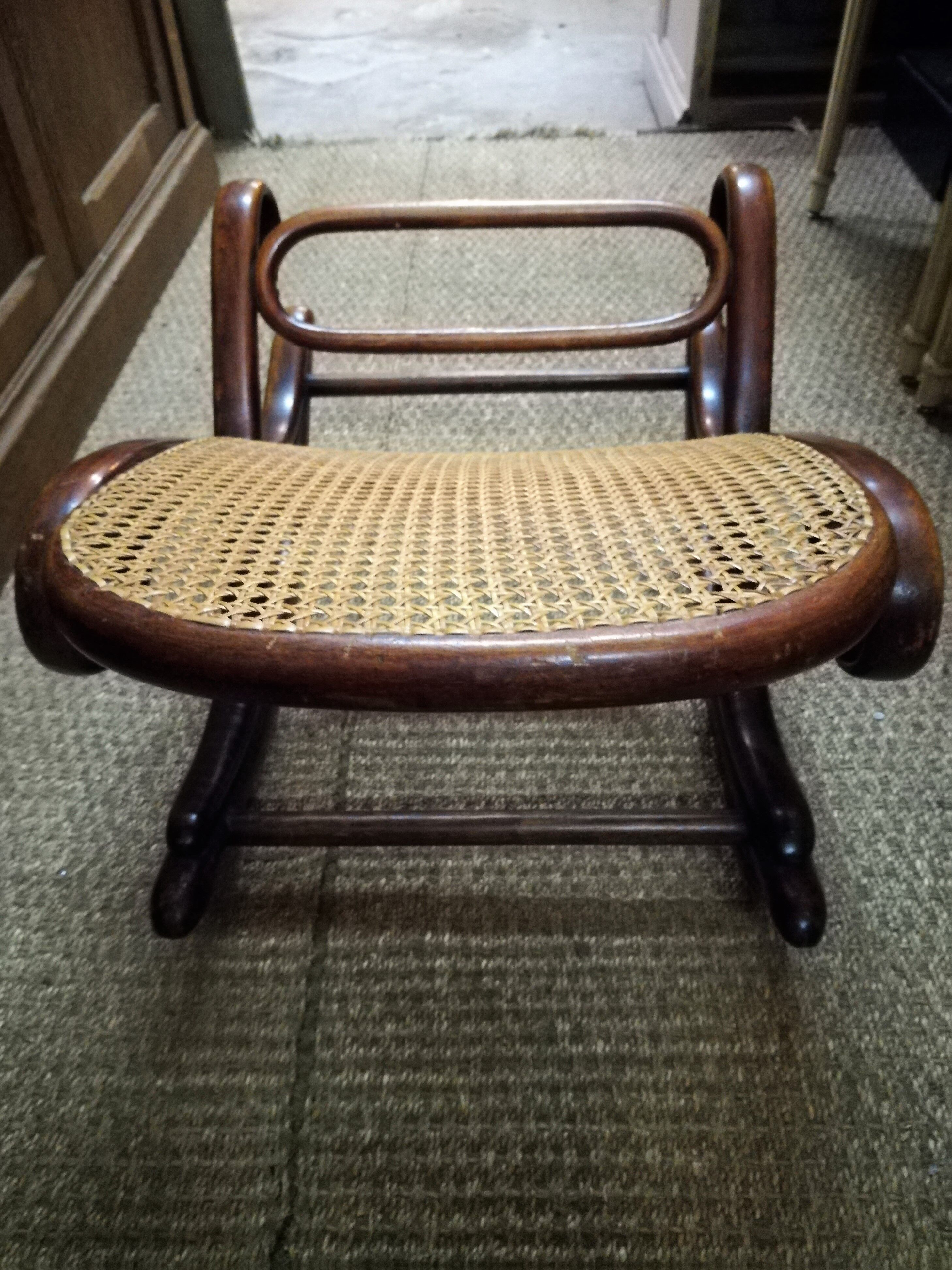 Curved wooden footrest