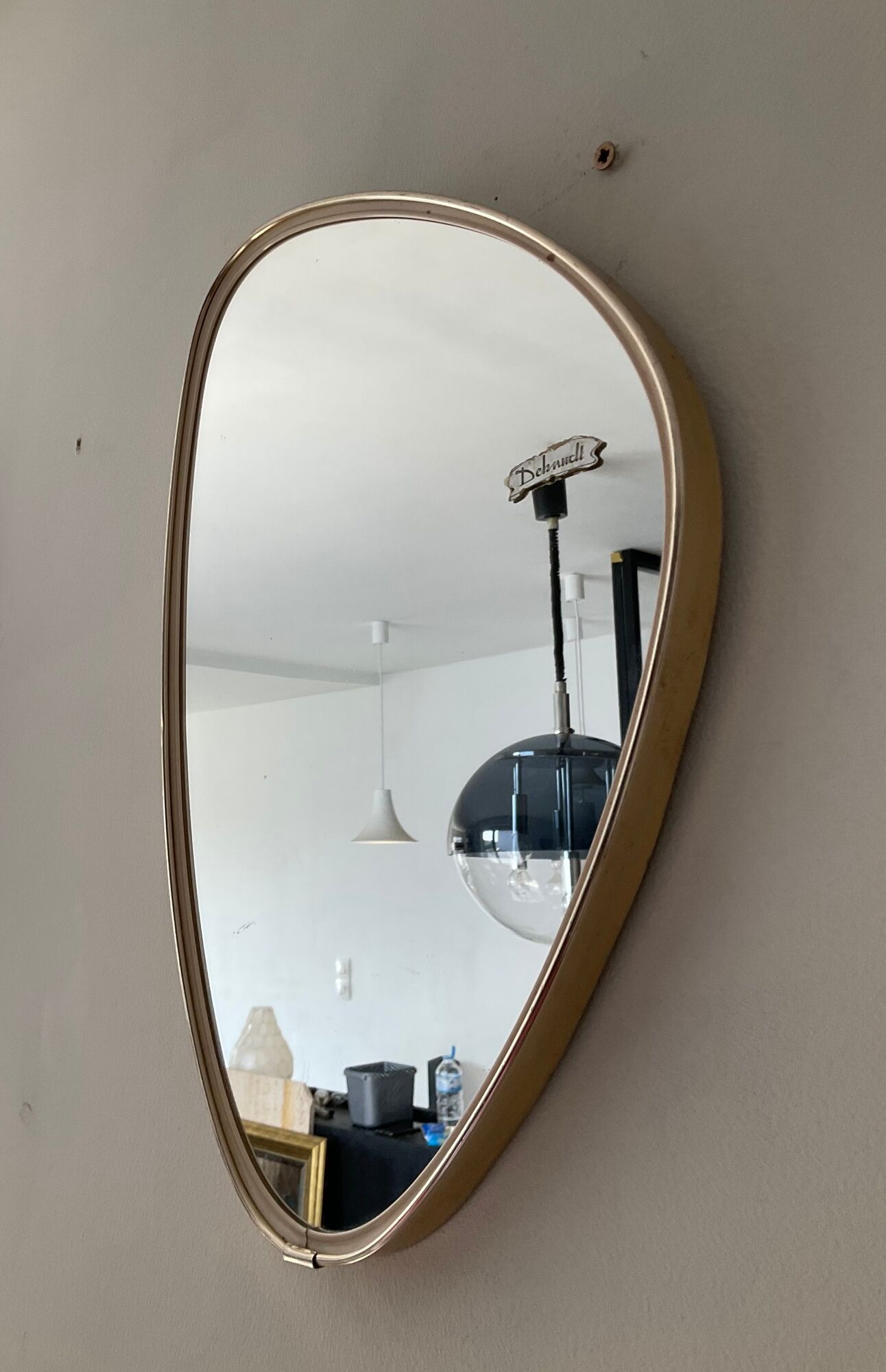Asymmetrical mirror Deknudt freeform from the 60s-70s