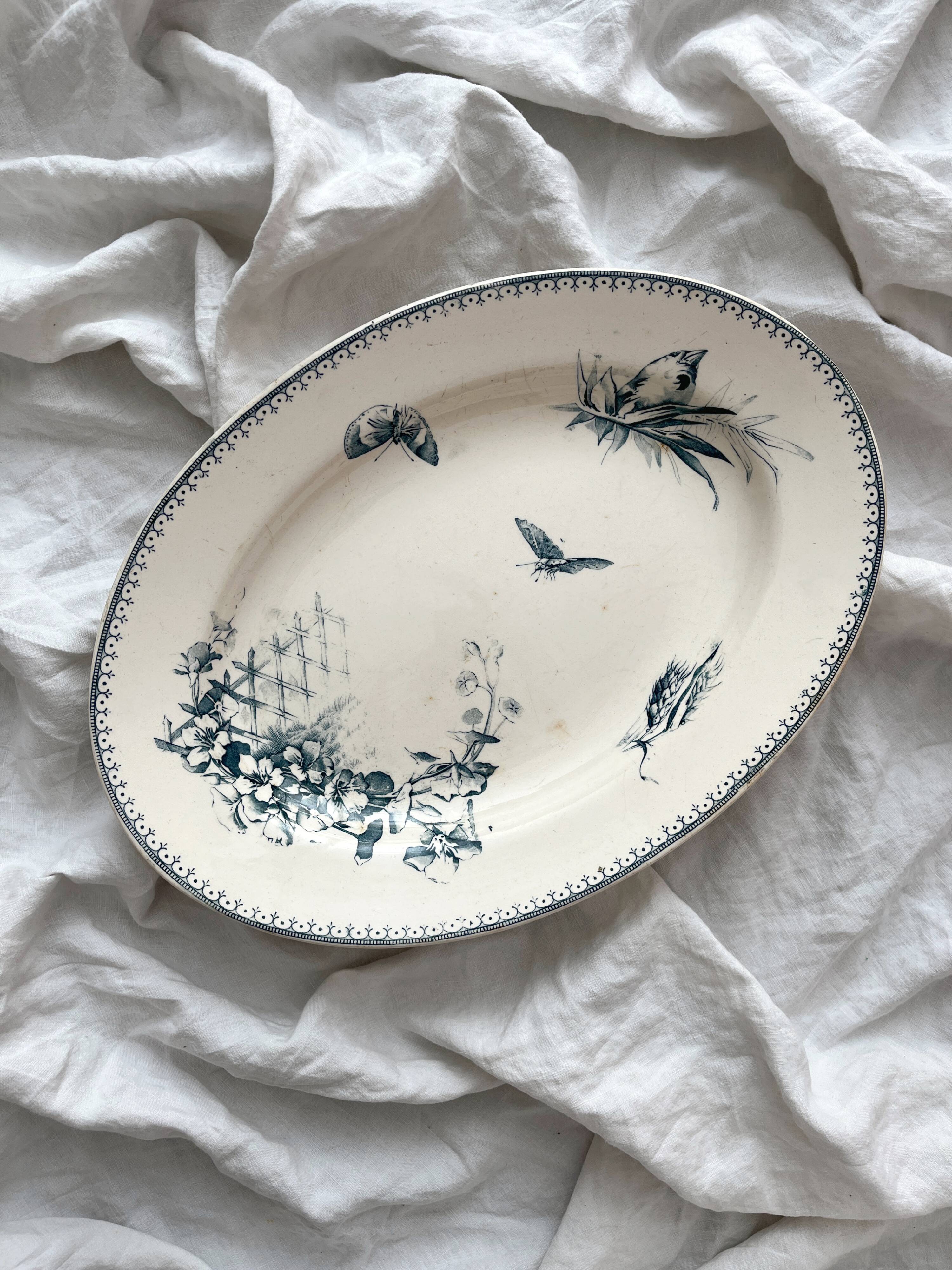 Oval ironstone dish with flowers and birds "Malaga" Petrus Regout