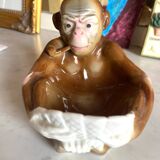 Pipe holder, ashtray or monkey pocket emptier
