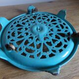 Dessous de plat ancien en fonte émaillé