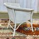 Fauteuil LLOYD LOOM des années 1950